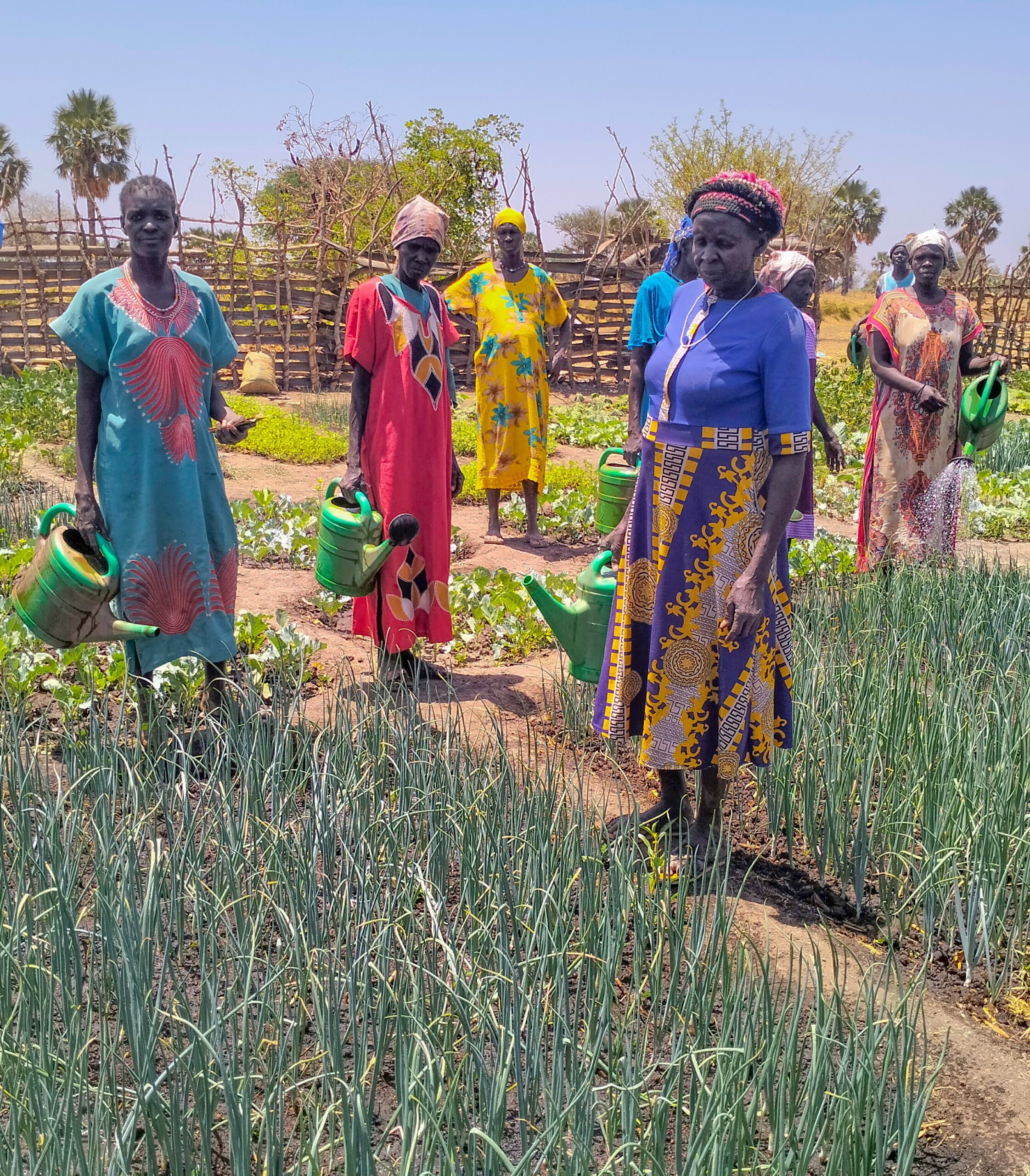 Women working in community garden